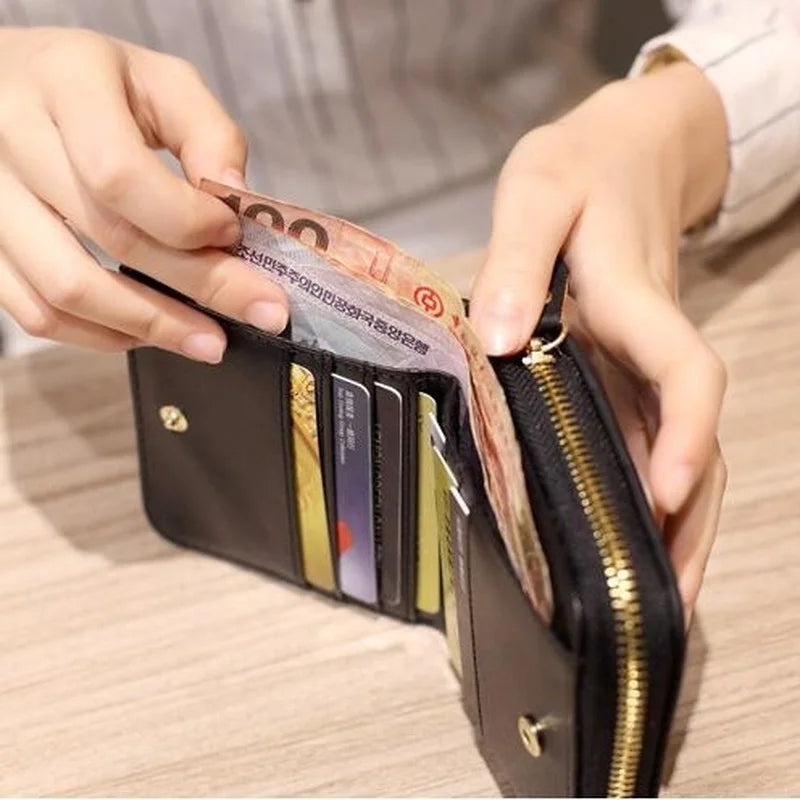 Compact quilted zip wallet with multiple card slots and coin pocket