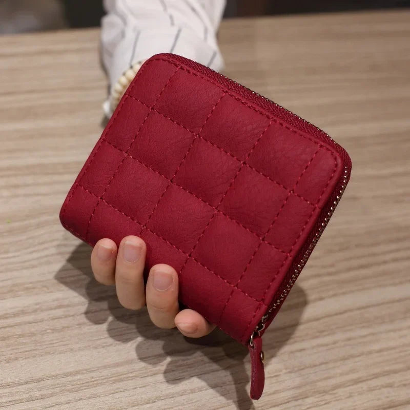 Compact quilted zip wallet with multiple card slots and coin pocket