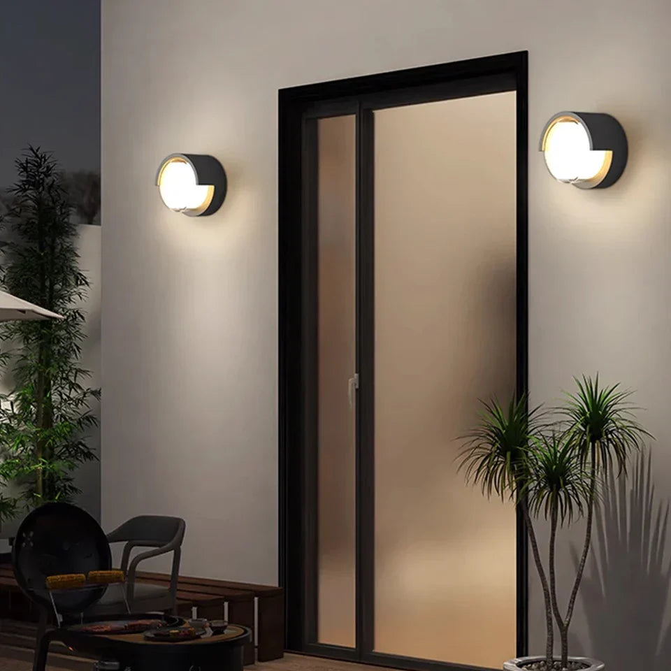 Round LED wall light with warm and cool white options for indoor and outdoor use