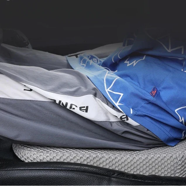 Car seat cushion with honeycomb structure and pressure relief support