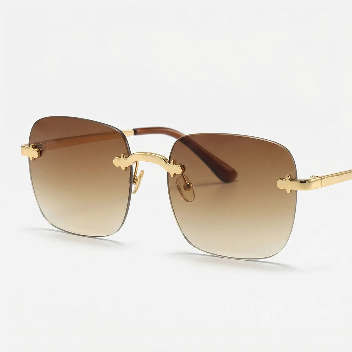 Square rimless sunglasses with mirror-tinted gradient lenses in oversized frameless design