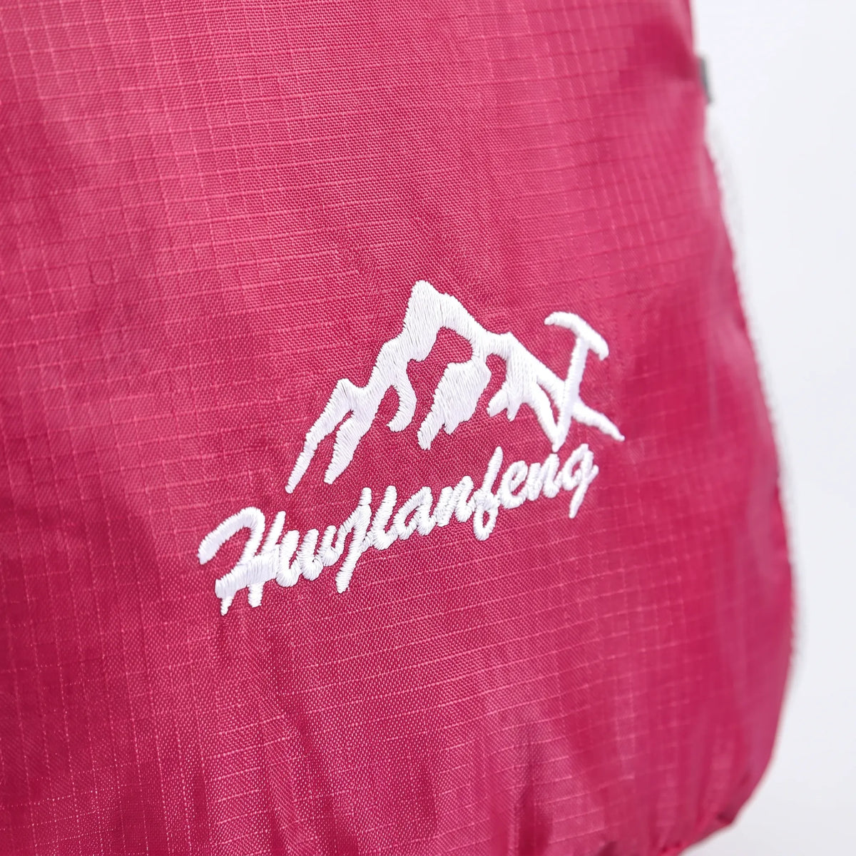 Foldable lightweight day pack with water-repellent material and ventilated mesh straps
