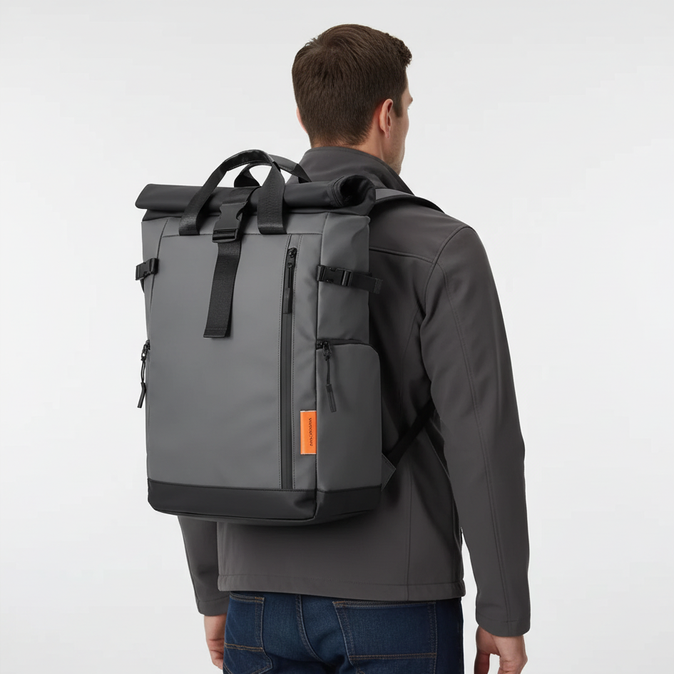Water-resistant laptop backpack with rolltop closure and luggage carry handle
