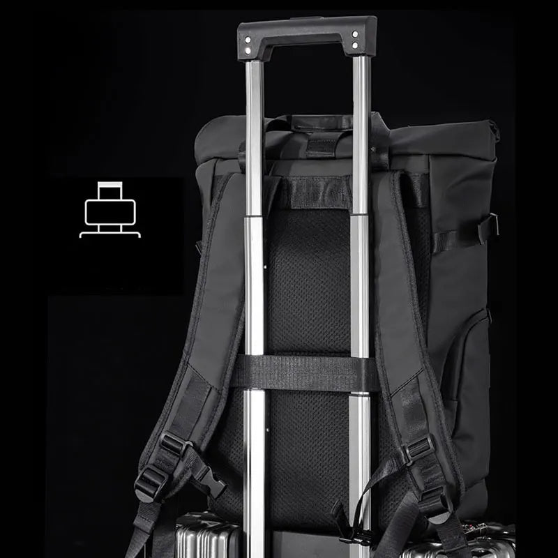 Water-resistant laptop backpack with rolltop closure and luggage carry handle