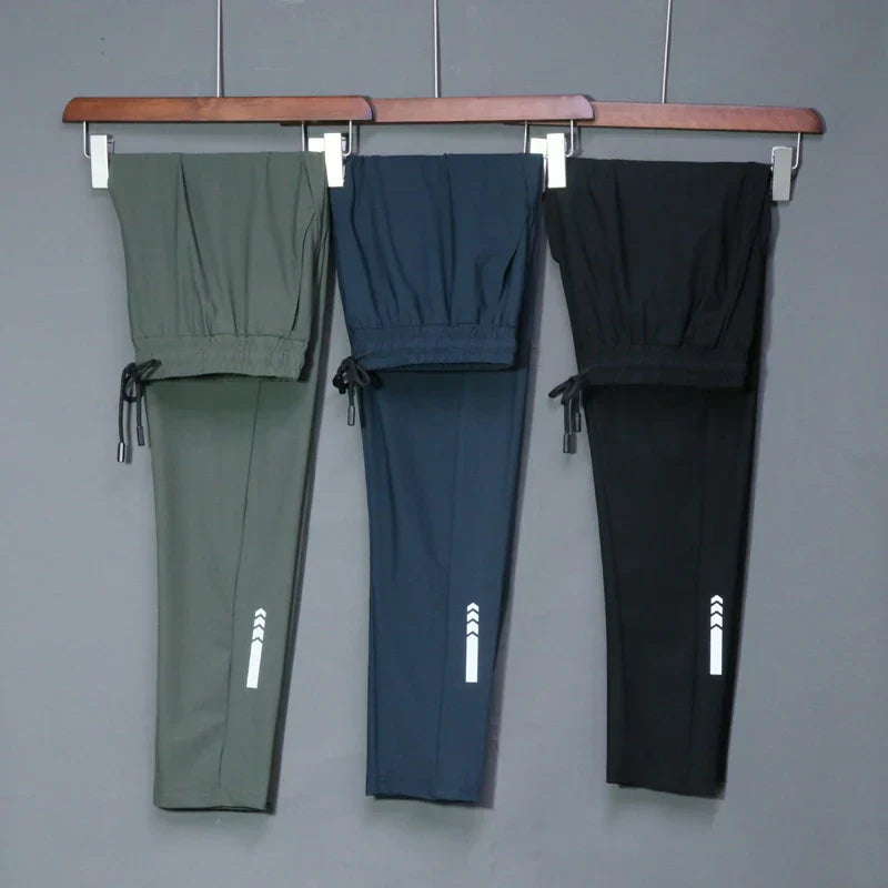 Men's slim tapered training pants with hidden phone pocket