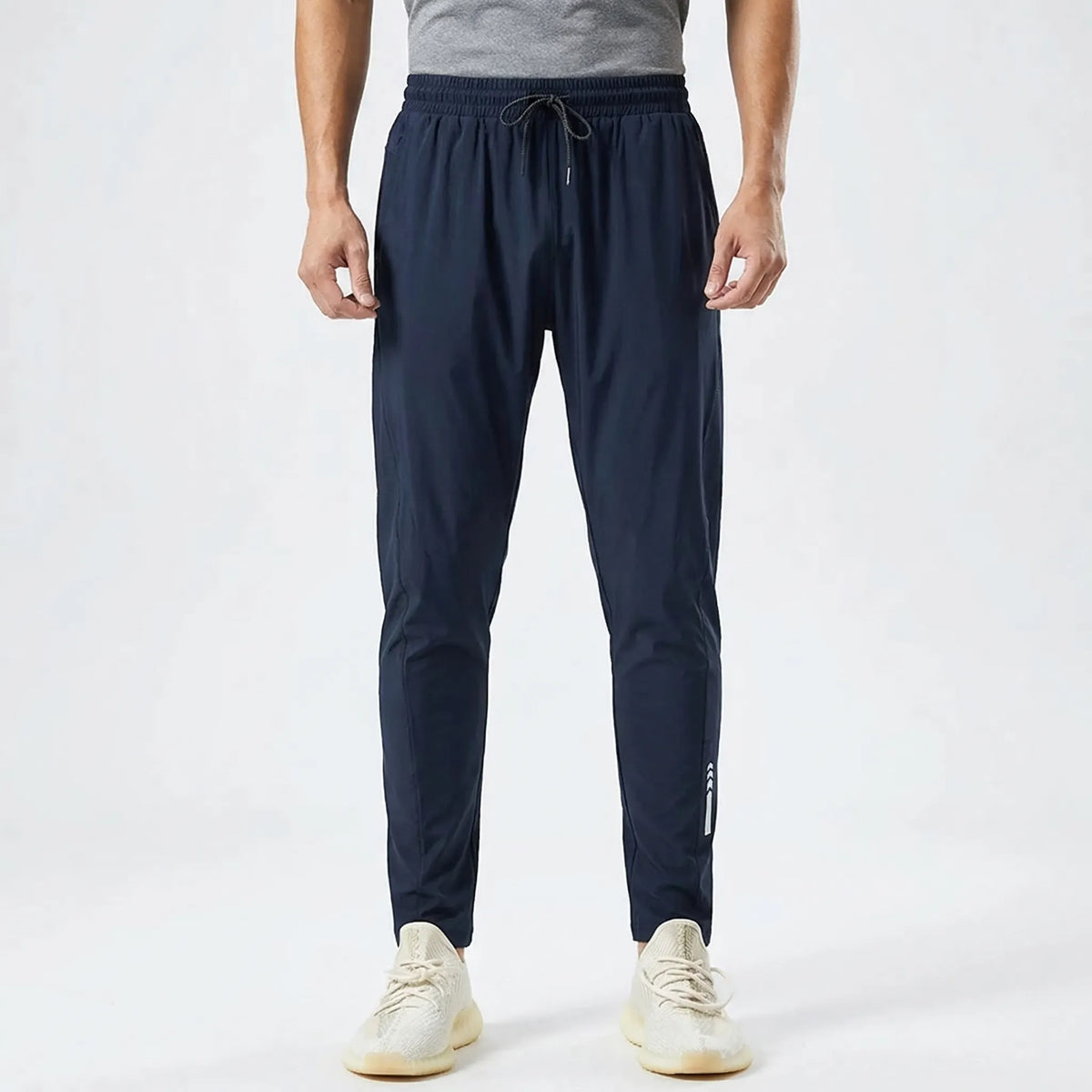 Men's slim tapered training pants with hidden phone pocket