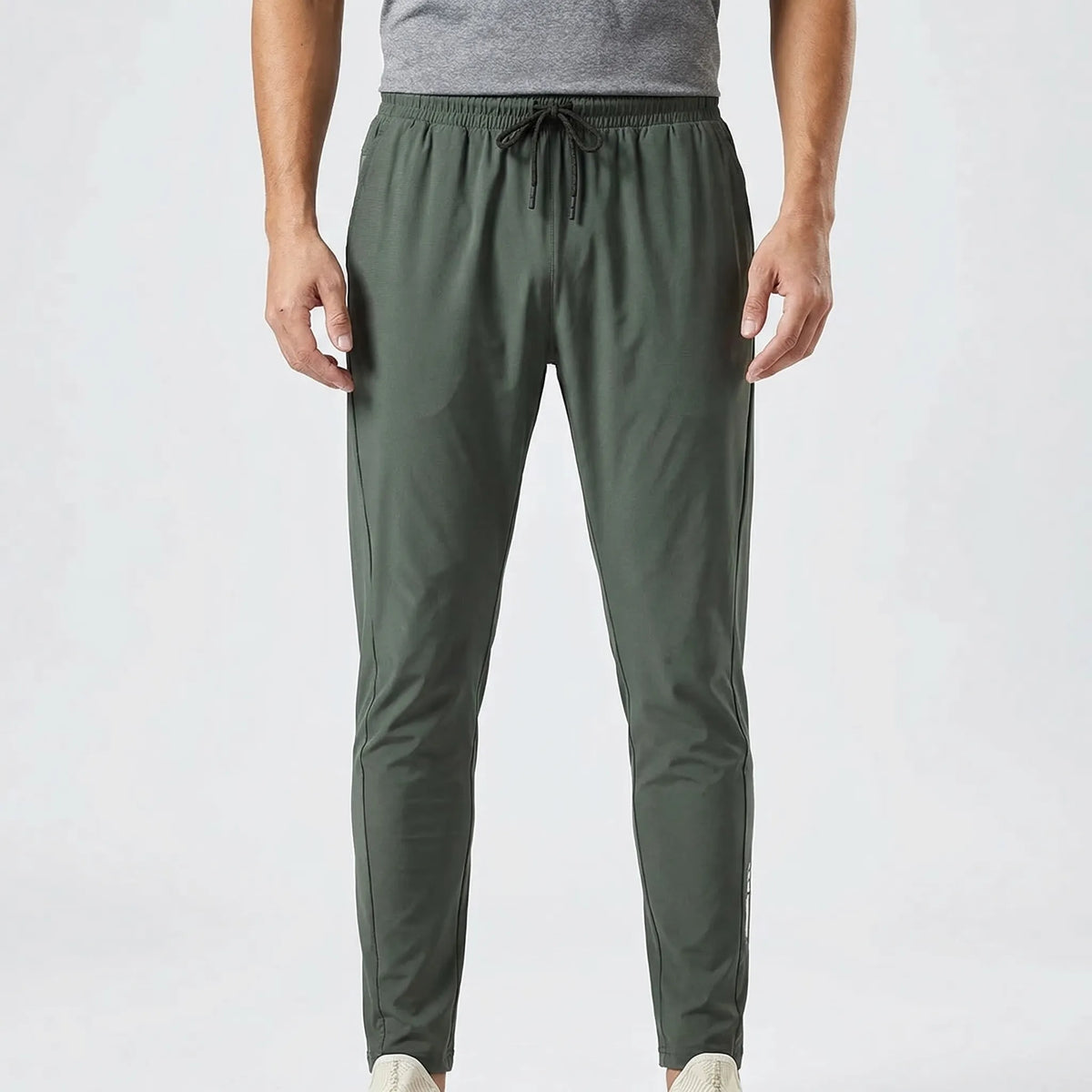 Men's slim tapered training pants with hidden phone pocket
