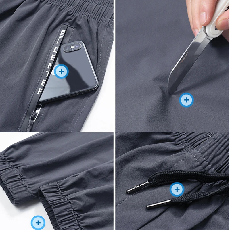 Men's quick drying running trousers with secure zip pockets and reflective accents