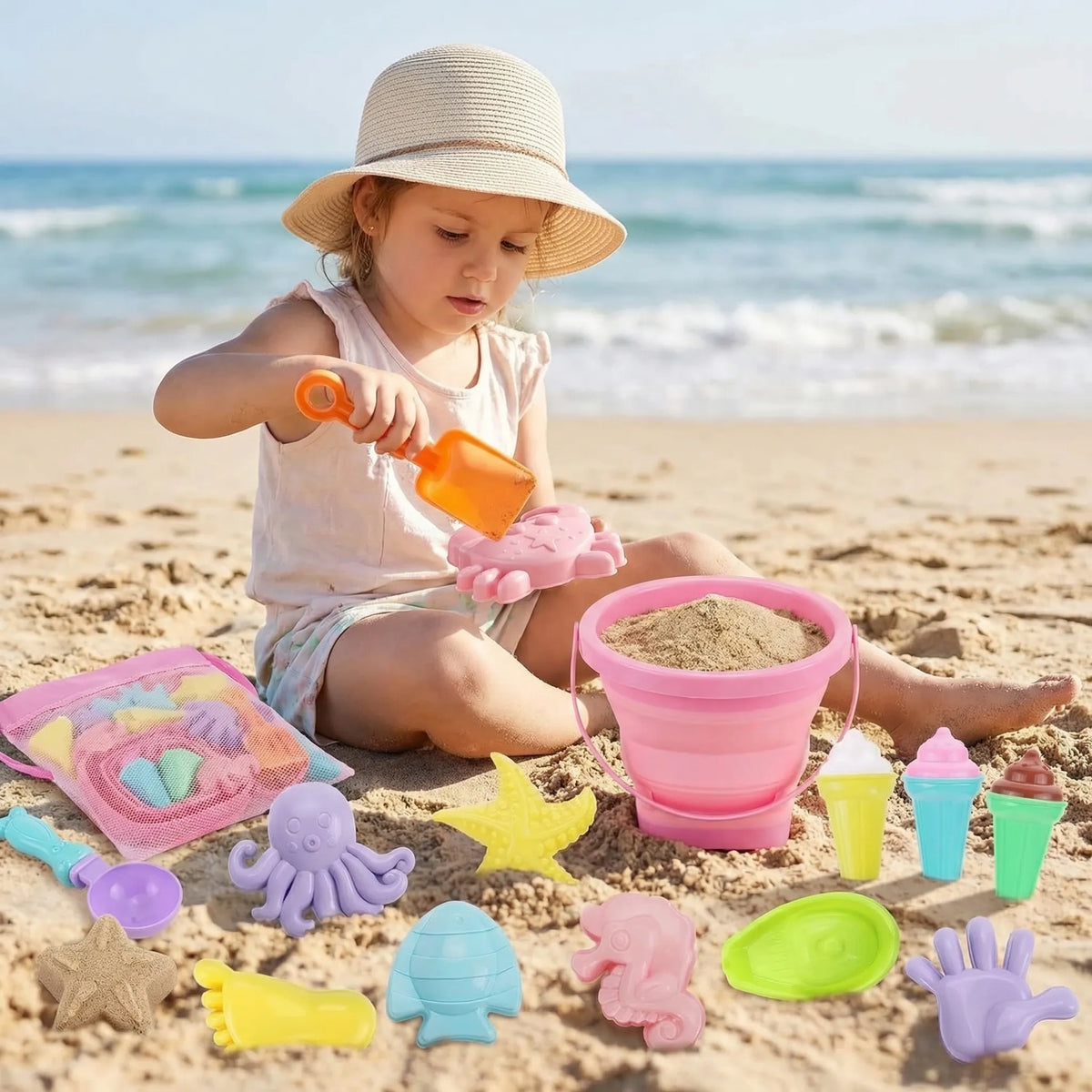 Kids beach toy set with collapsible bucket and sand moulds
