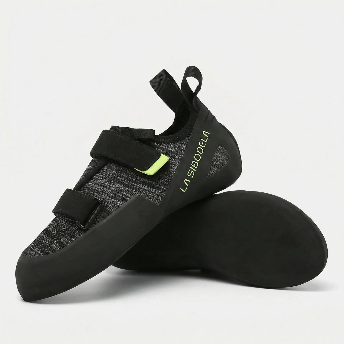 Climbing shoes with velcro straps and grippy rubber sole for indoor and outdoor use
