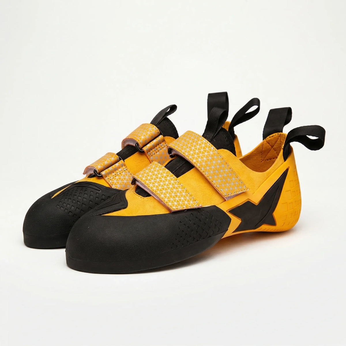 Climbing shoes with velcro straps and grippy rubber sole for indoor and outdoor use