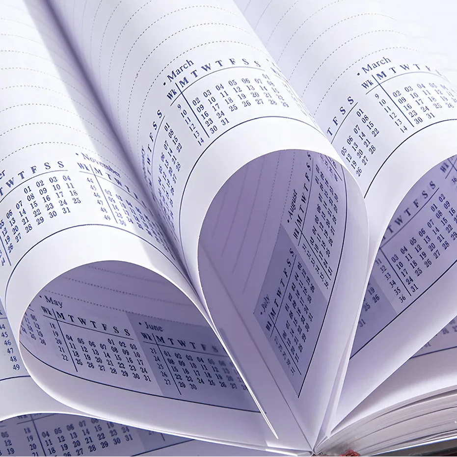 Compact A5 bilingual planner with weekly and monthly pages