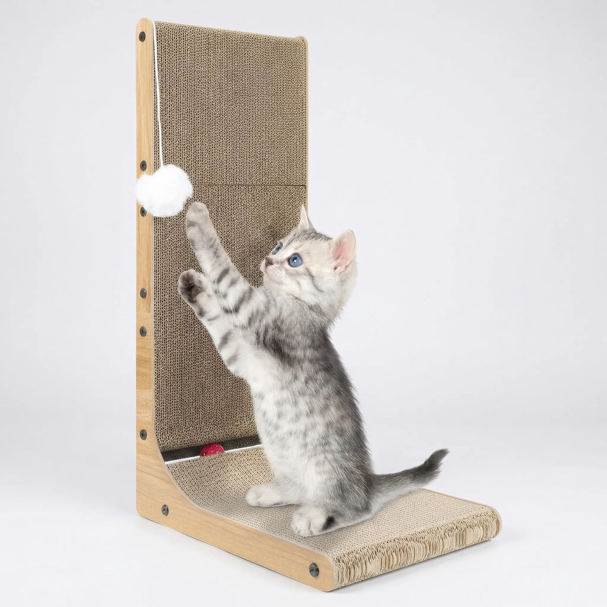 L-shaped cat scratcher with vertical panel and ramp base featuring hanging ball toy
