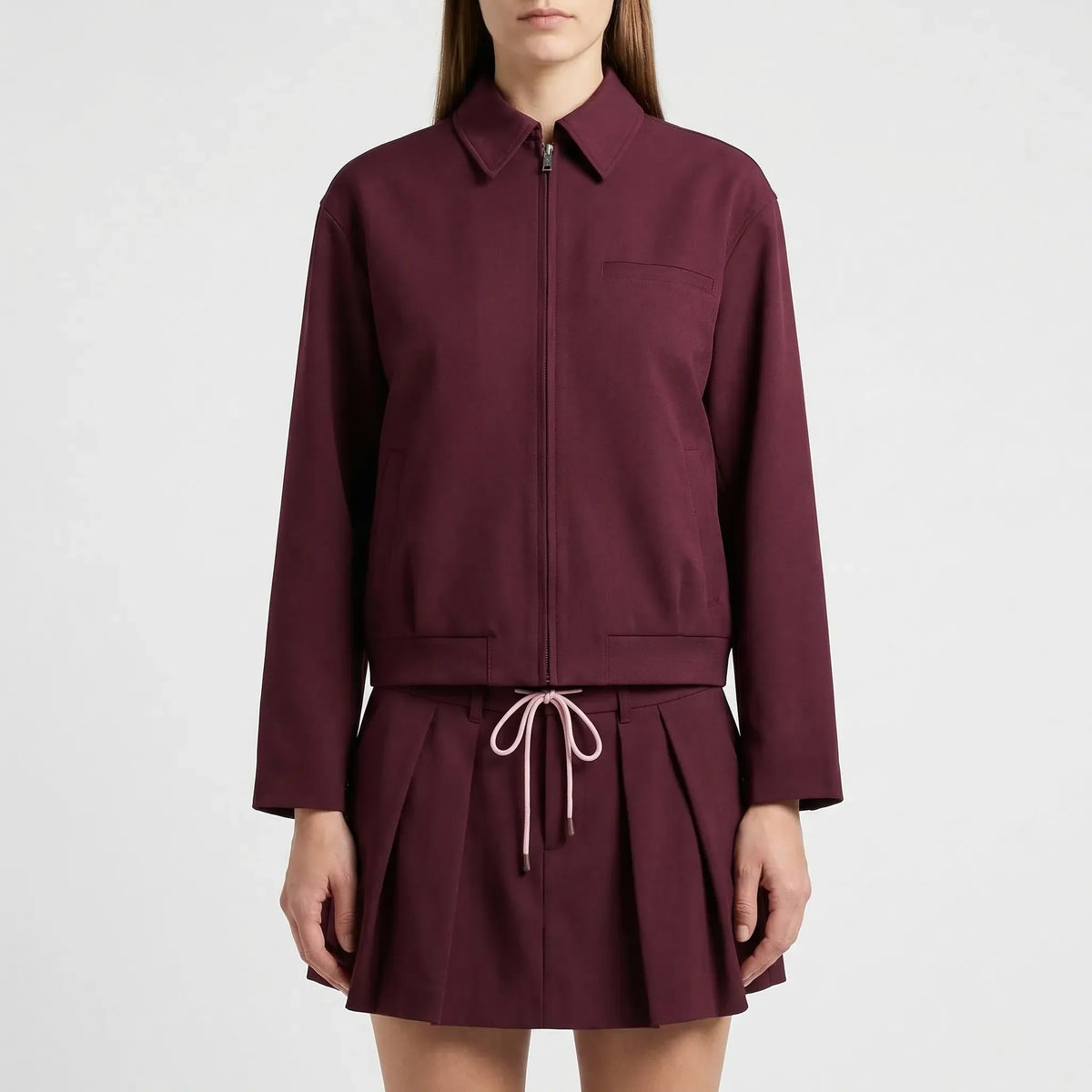 Women's oversized zip jacket and pleated mini skirt set