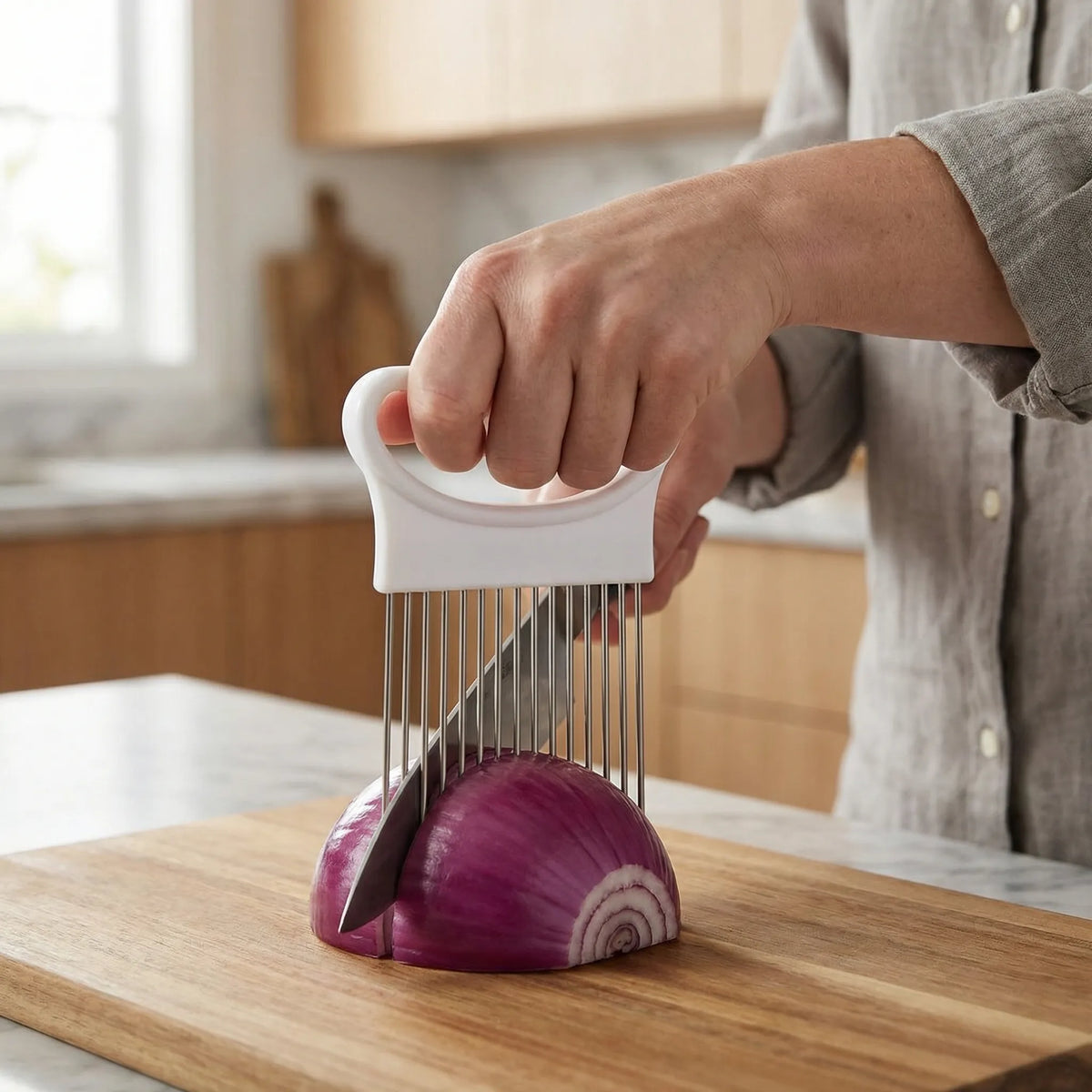 Hand-guided slicing guide with metal prongs for uniform vegetable cuts
