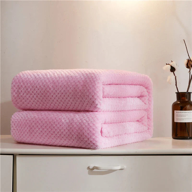 Thick knitted throw blanket with silky soft surface