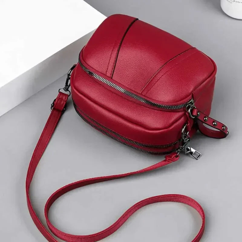Small pebble leather crossbody bag with adjustable strap