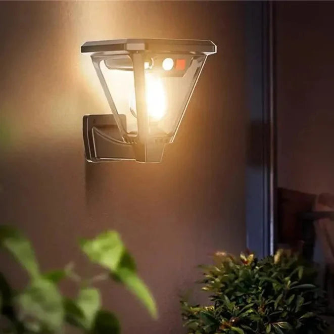 Solar motion sensor light with dual wall and ground mount installation options