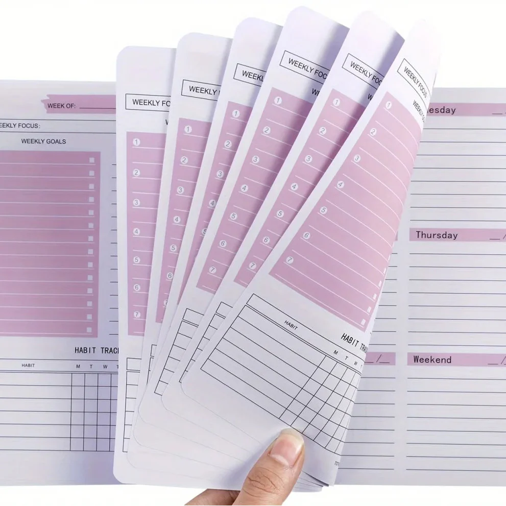 Weekly spiral planner with two-page spreads and habit tracker