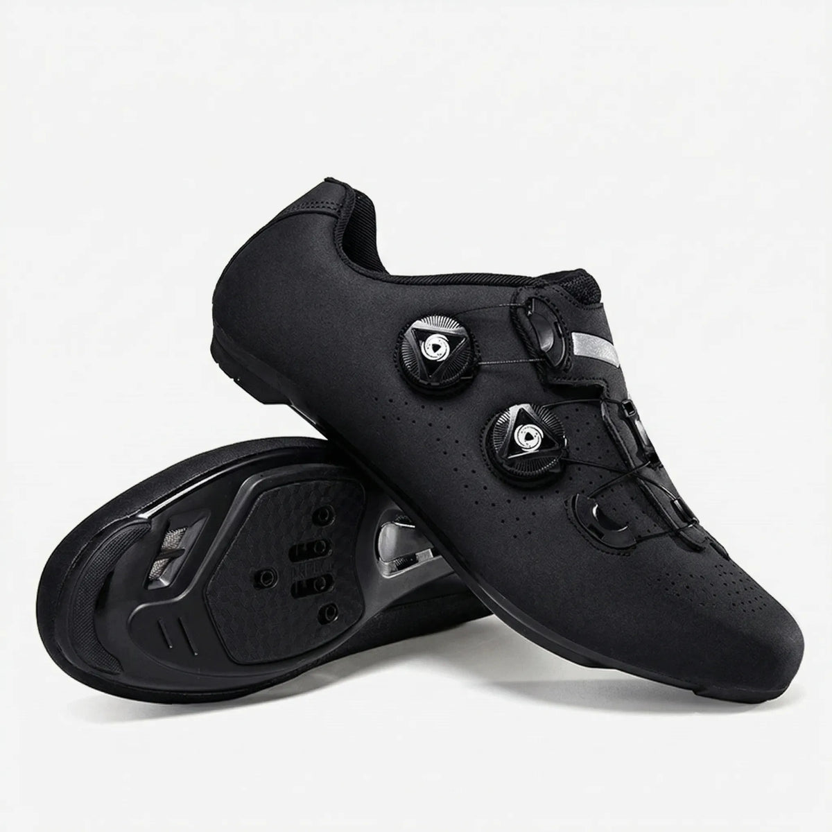 Self-locking cycling shoe with dual dial closure and perforated upper