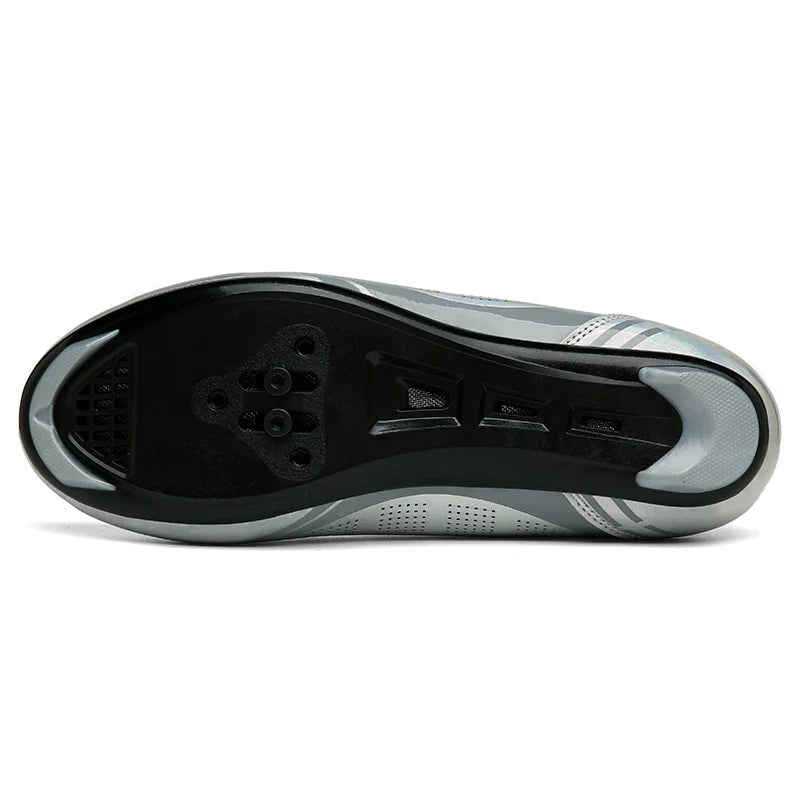 Self-locking cycling shoe with dual rotary dials and perforated breathable upper