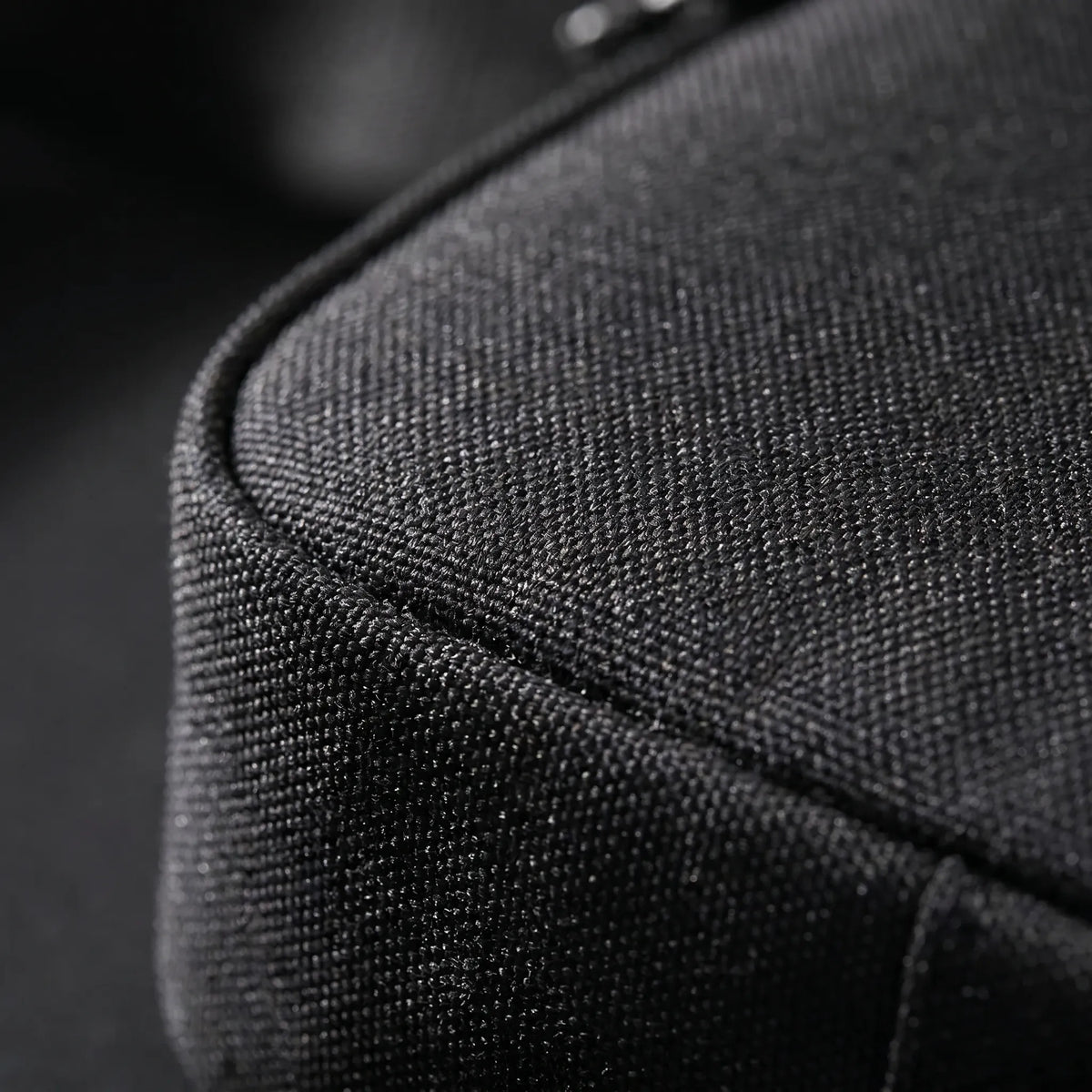 Men's small square crossbody bag with zip compartments and woven material