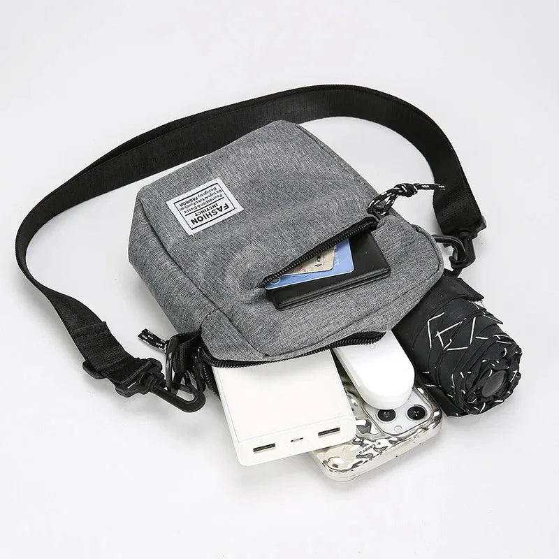Men's small square crossbody bag with zip compartments and woven material