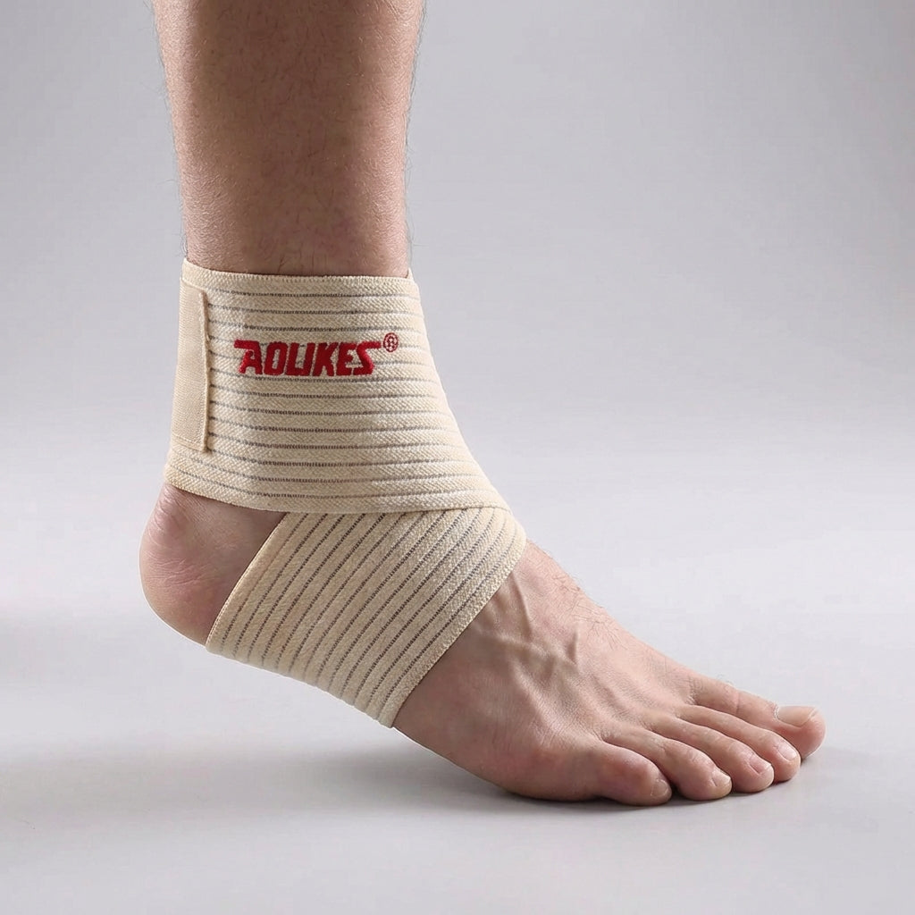 Adjustable ankle support wrap with targeted compression and breathable design