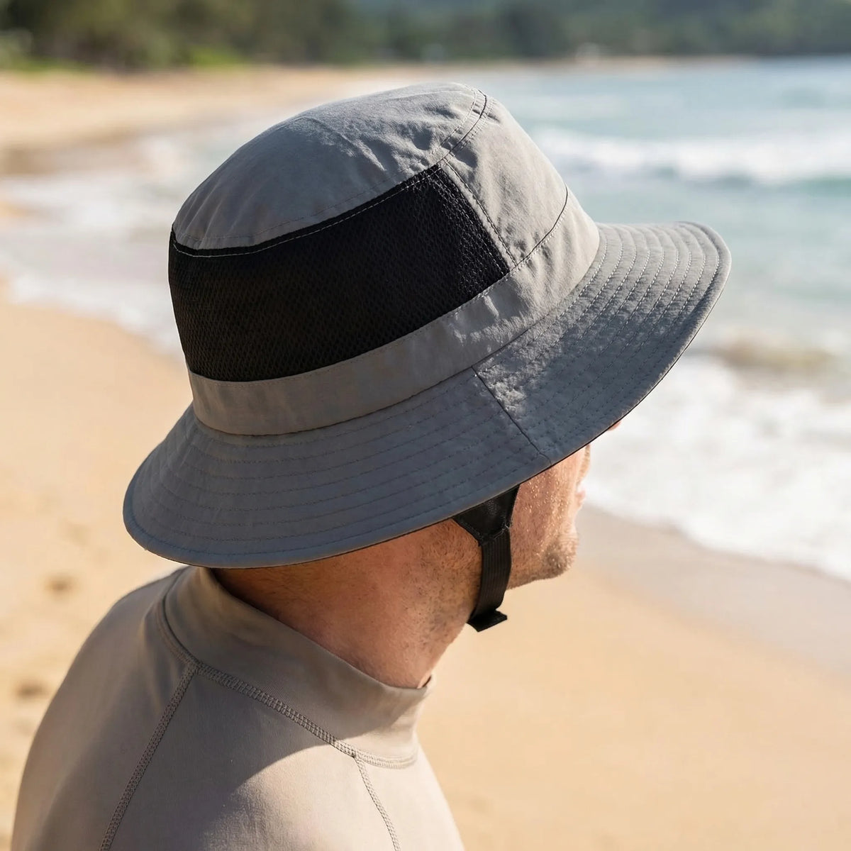 Mesh bucket hat with UPF50+ sun rating and adjustable chin strap