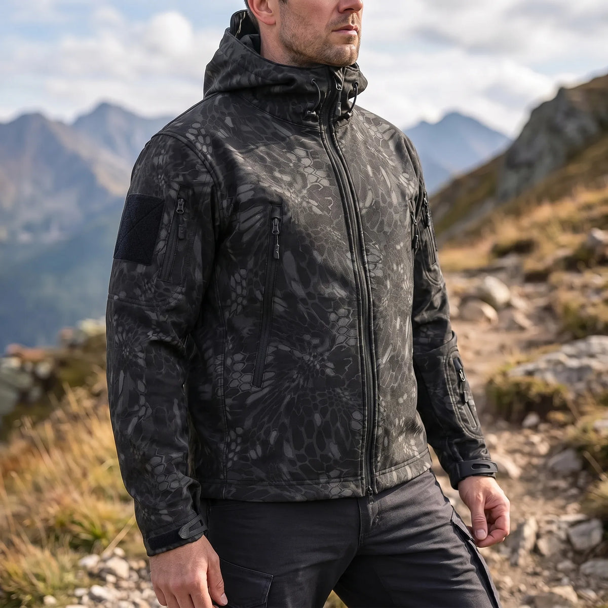 Tactical soft shell jacket with wind-resistant fabric and adjustable hood