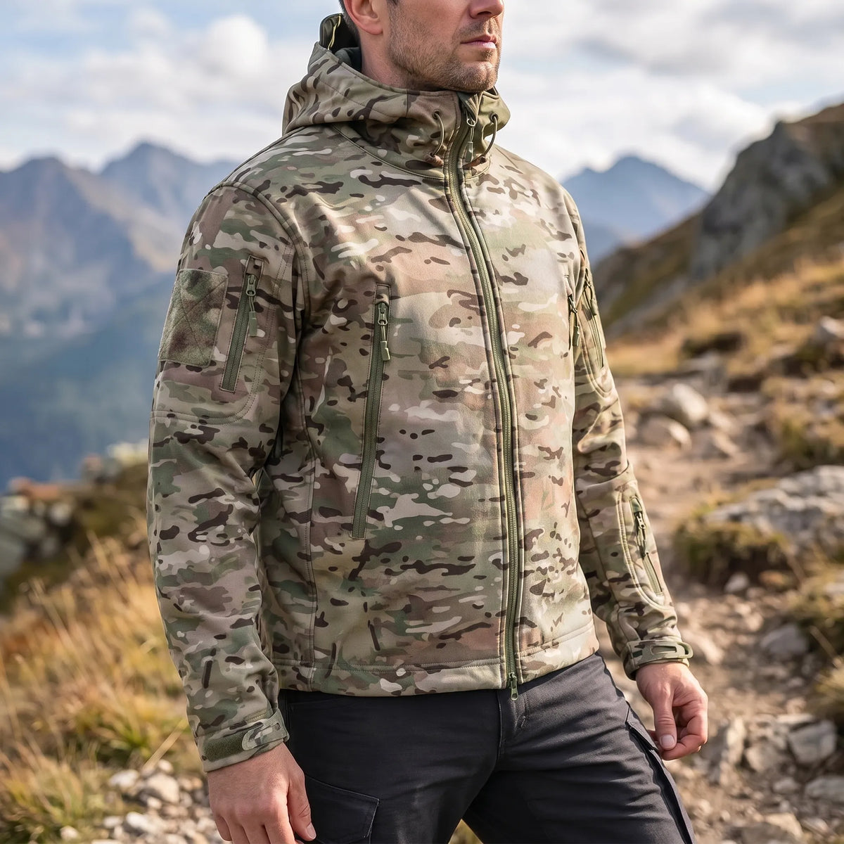 Tactical soft shell jacket with wind-resistant fabric and adjustable hood
