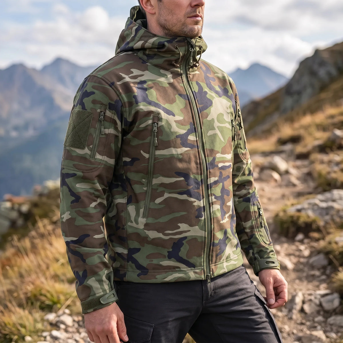 Tactical soft shell jacket with wind-resistant fabric and adjustable hood