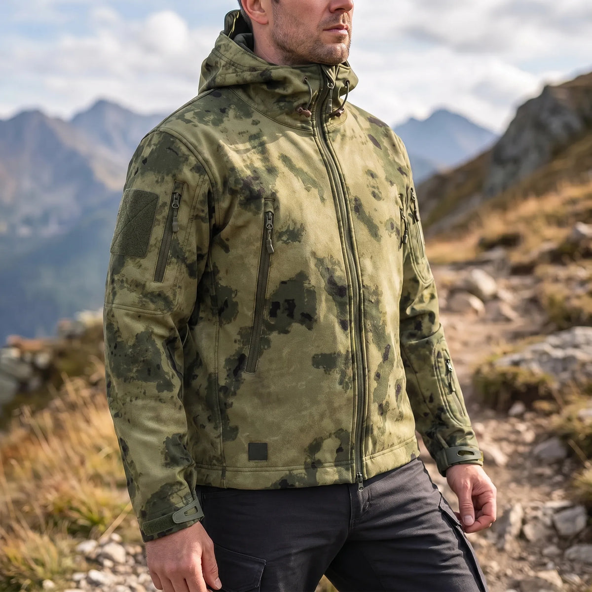 Tactical soft shell jacket with wind-resistant fabric and adjustable hood