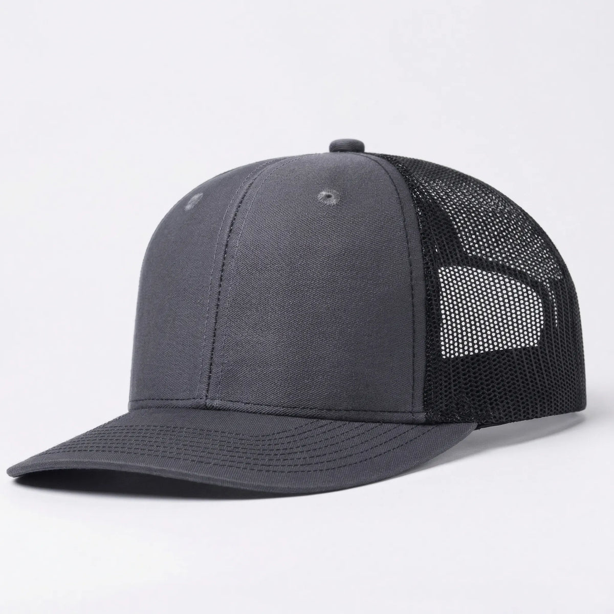Unisex trucker cap with slightly curved brim and breathable mesh back