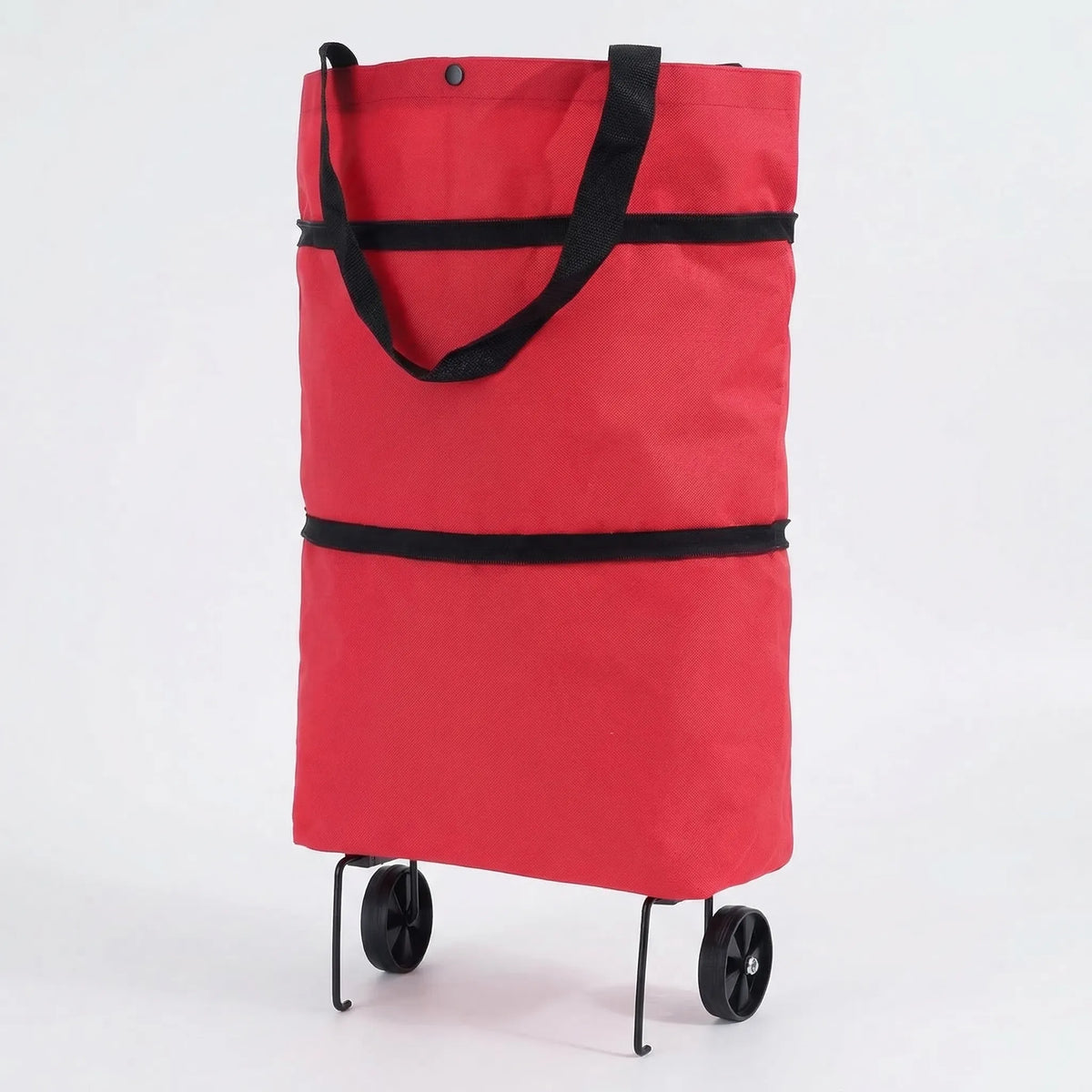 Foldable wheeled shopping trolley with retractable handle