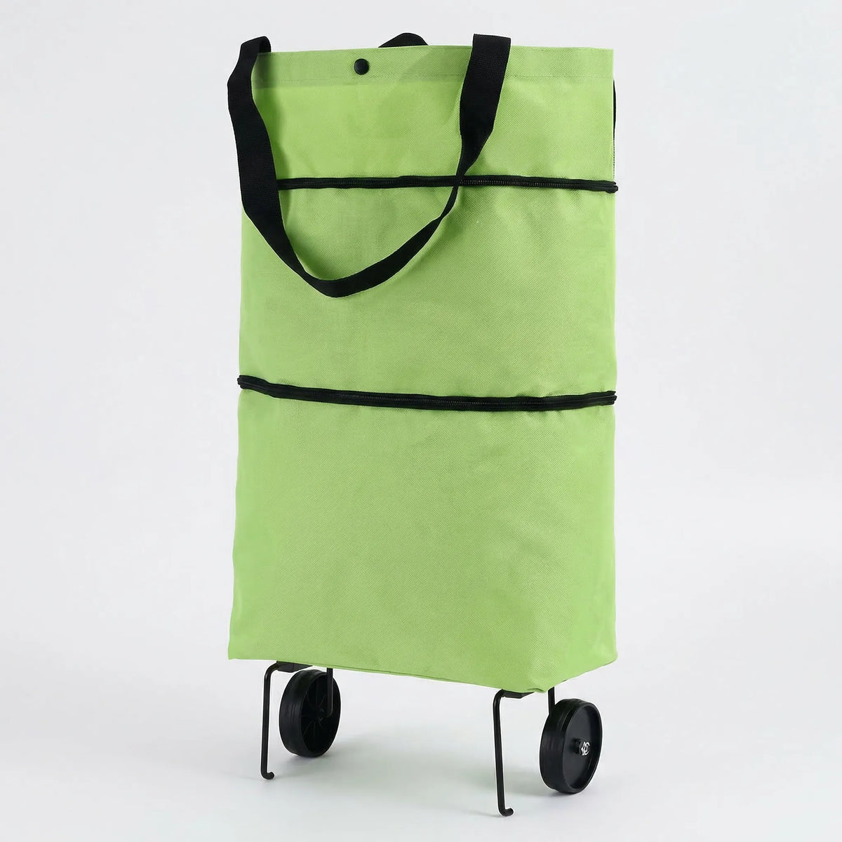 Foldable wheeled shopping trolley with retractable handle
