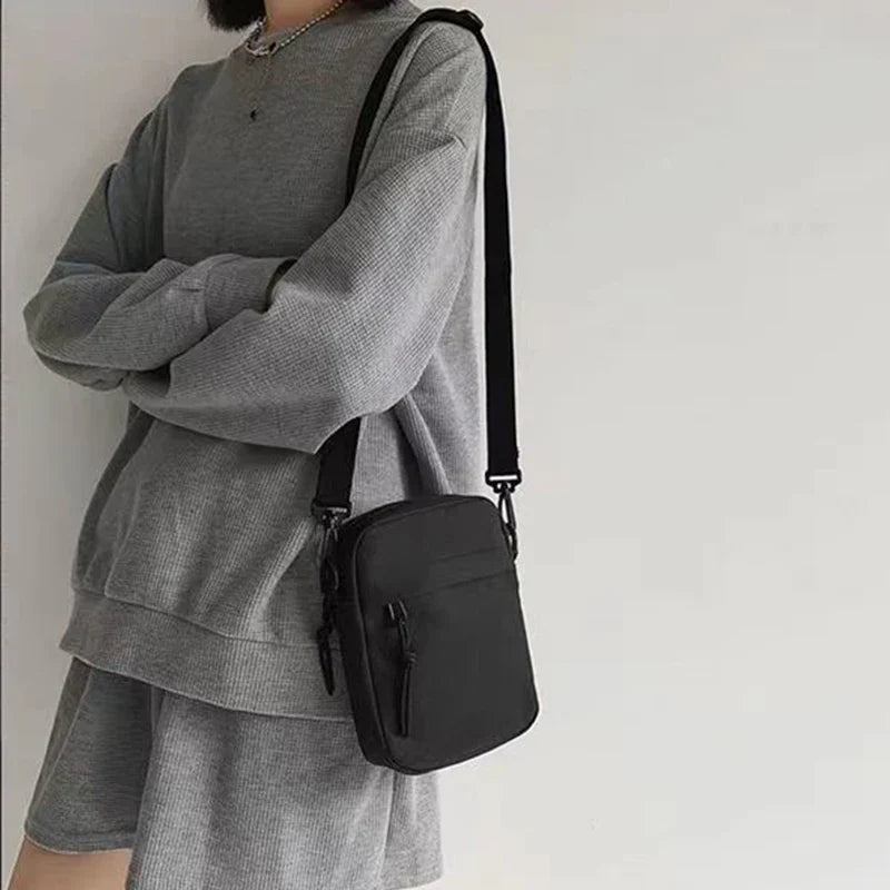 Unisex nylon crossbody bag with adjustable shoulder strap