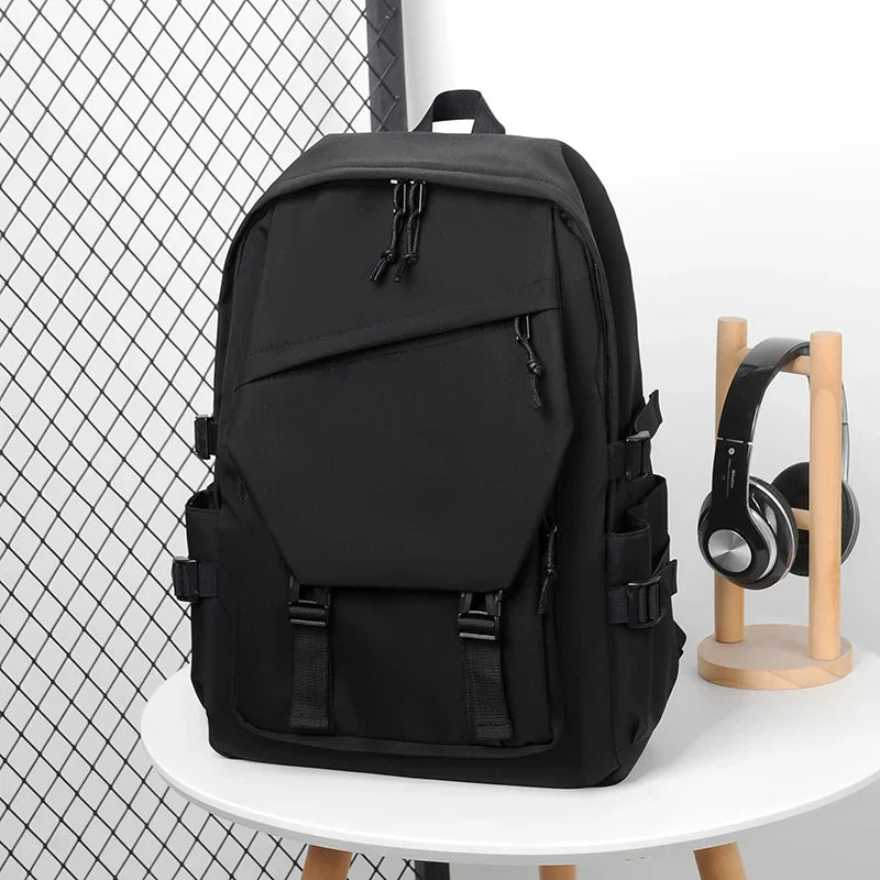 Large backpack with laptop compartment multiple pockets solid colour