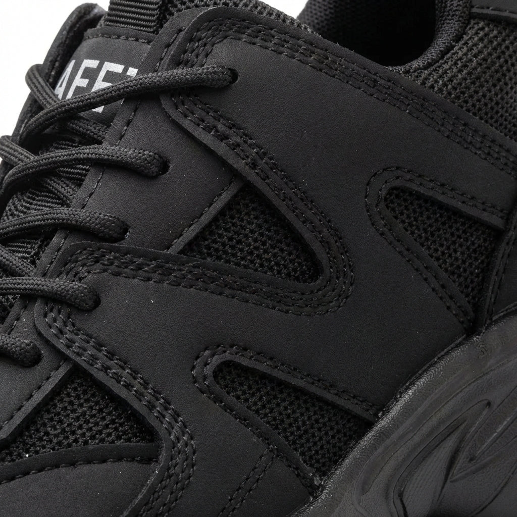 Low profile safety sneakers with reinforced toe protection and slip-resistant sole