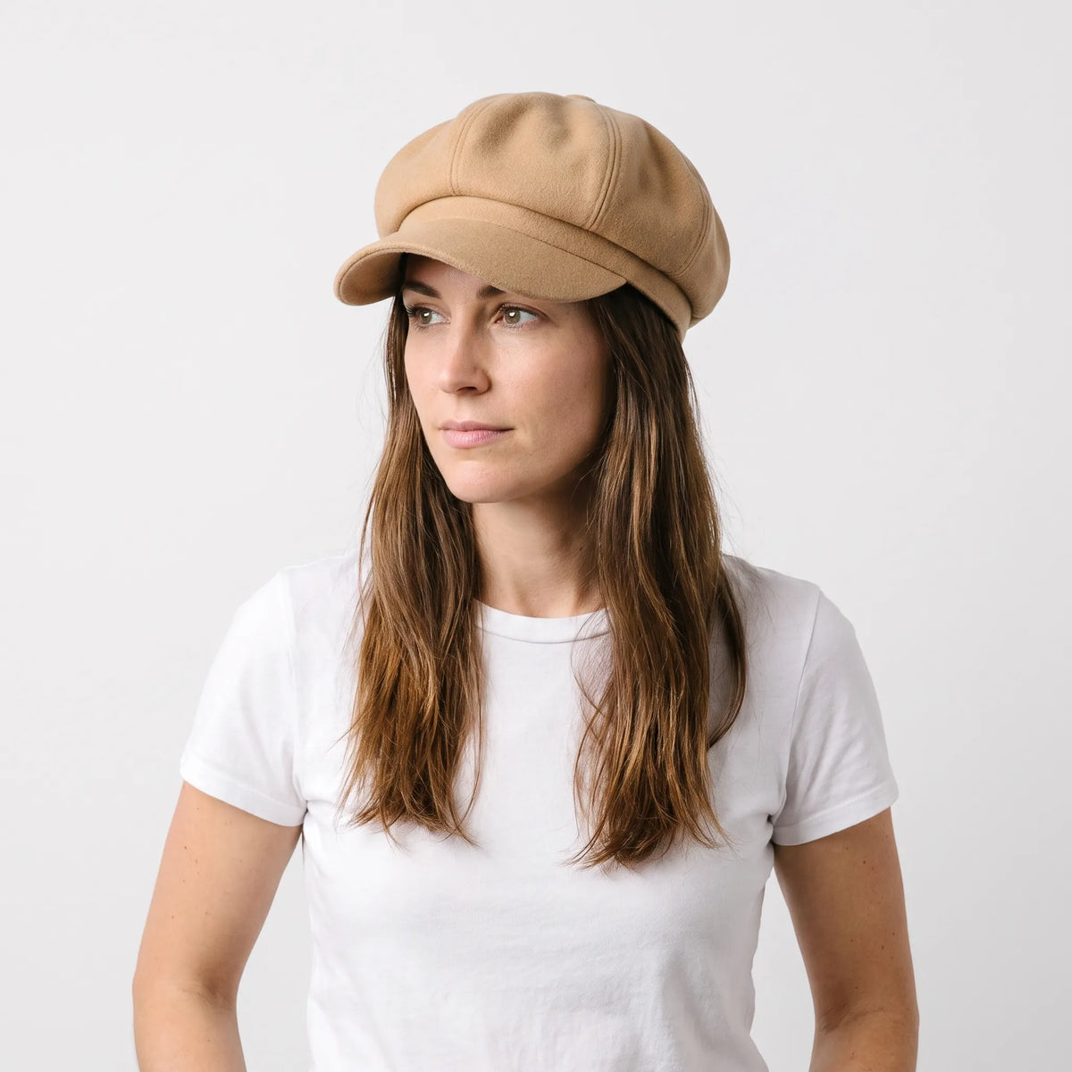 Classic beret hat with peak and solid colour design for cool weather