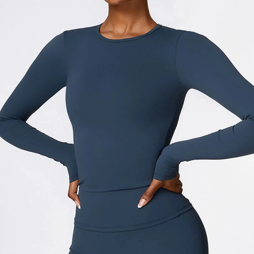 Long sleeve athletic top with quick-dry breathable fabric and stretchy waist