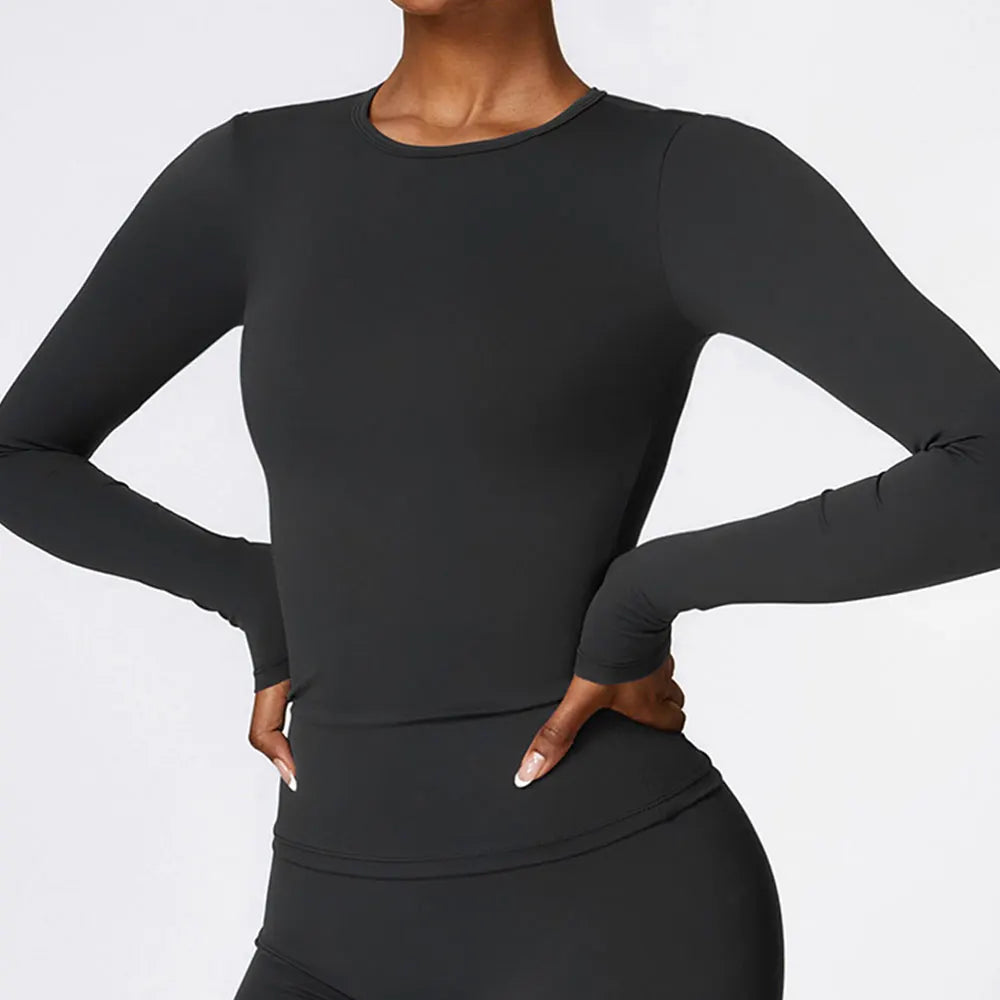 Long sleeve athletic top with quick-dry breathable fabric and stretchy waist