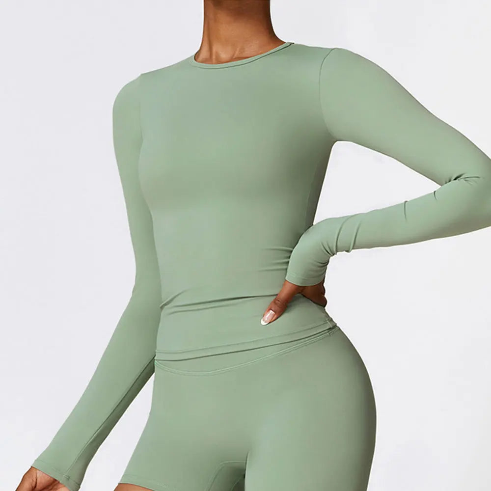 Long sleeve athletic top with quick-dry breathable fabric and stretchy waist