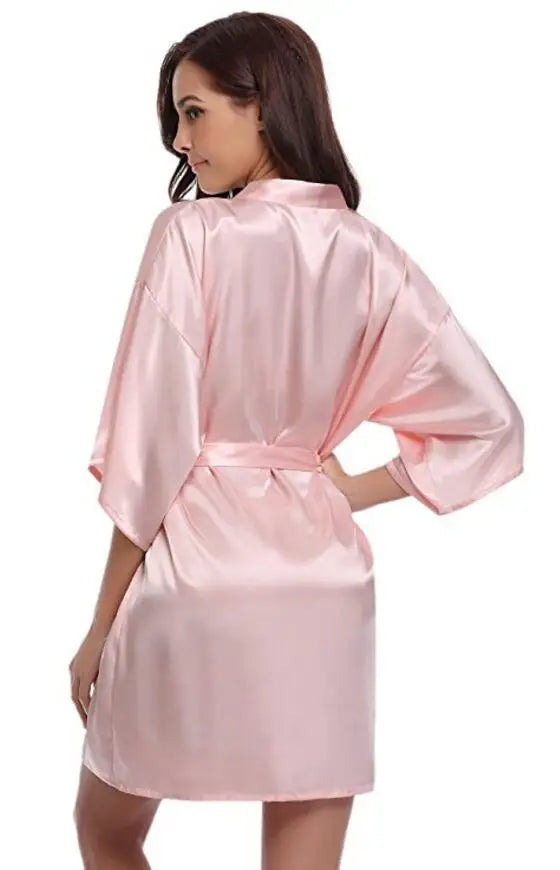 Short kimono style robe with wide sleeves and adjustable tie waist