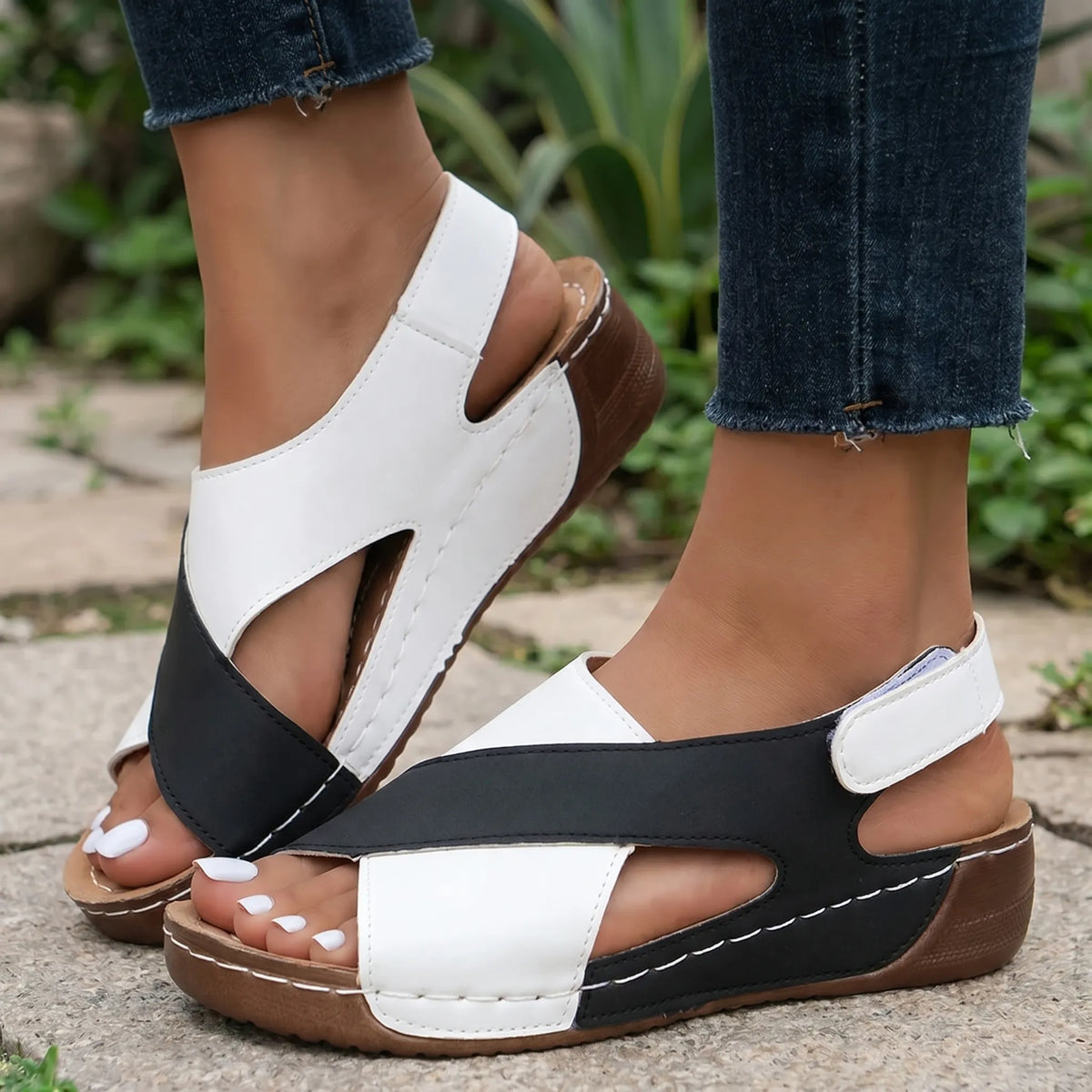 Lightweight wedge sandals with two-tone cross-strap design for summer