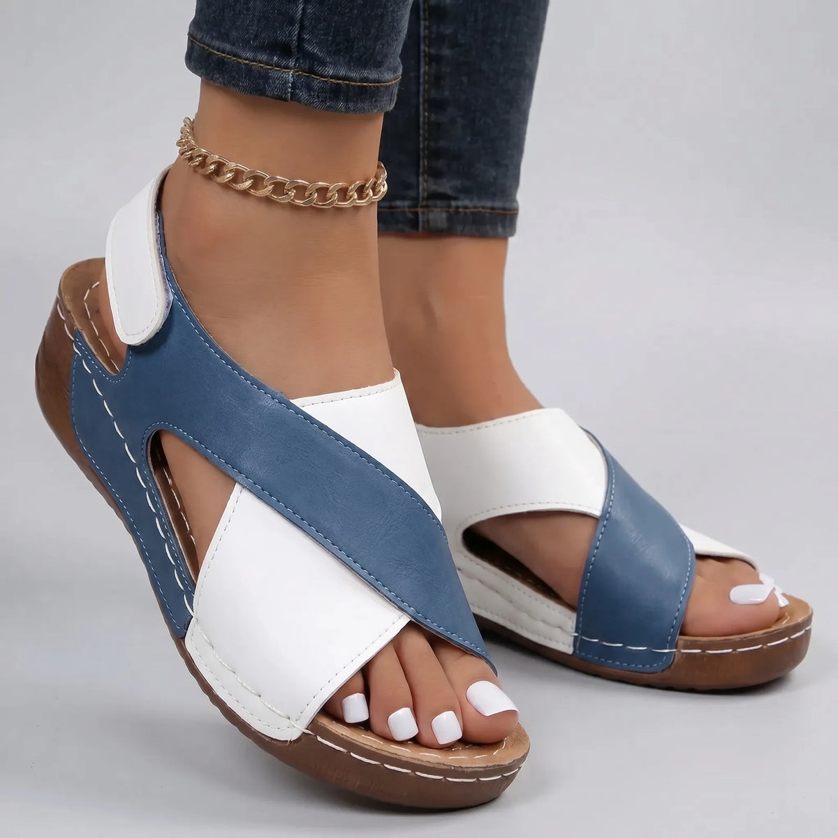 Lightweight wedge sandals with two-tone cross-strap design for summer