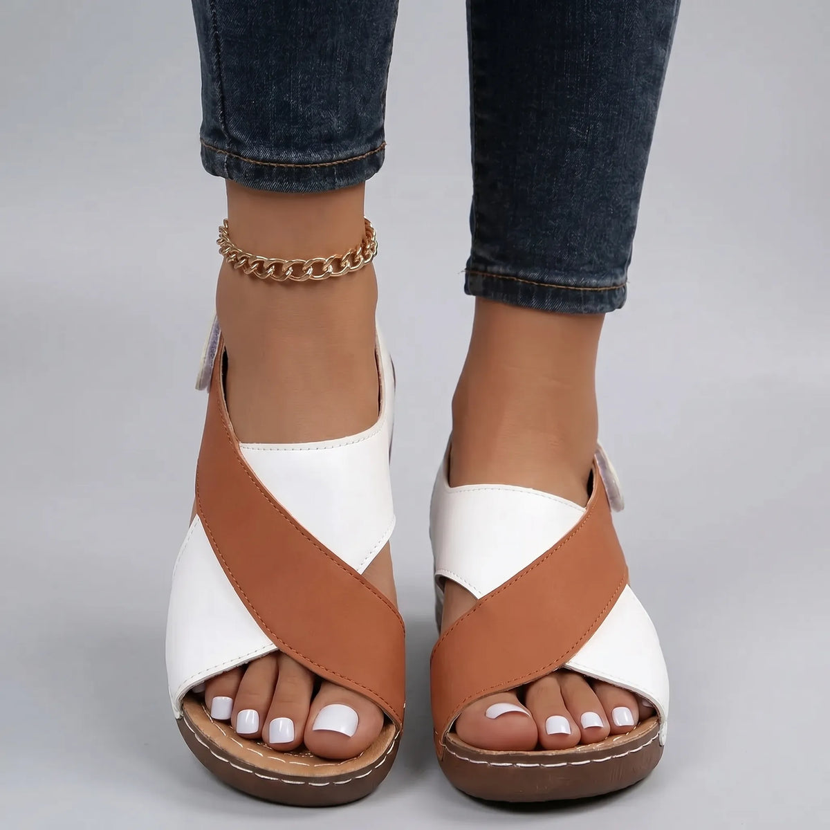 Lightweight wedge sandals with two-tone cross-strap design for summer