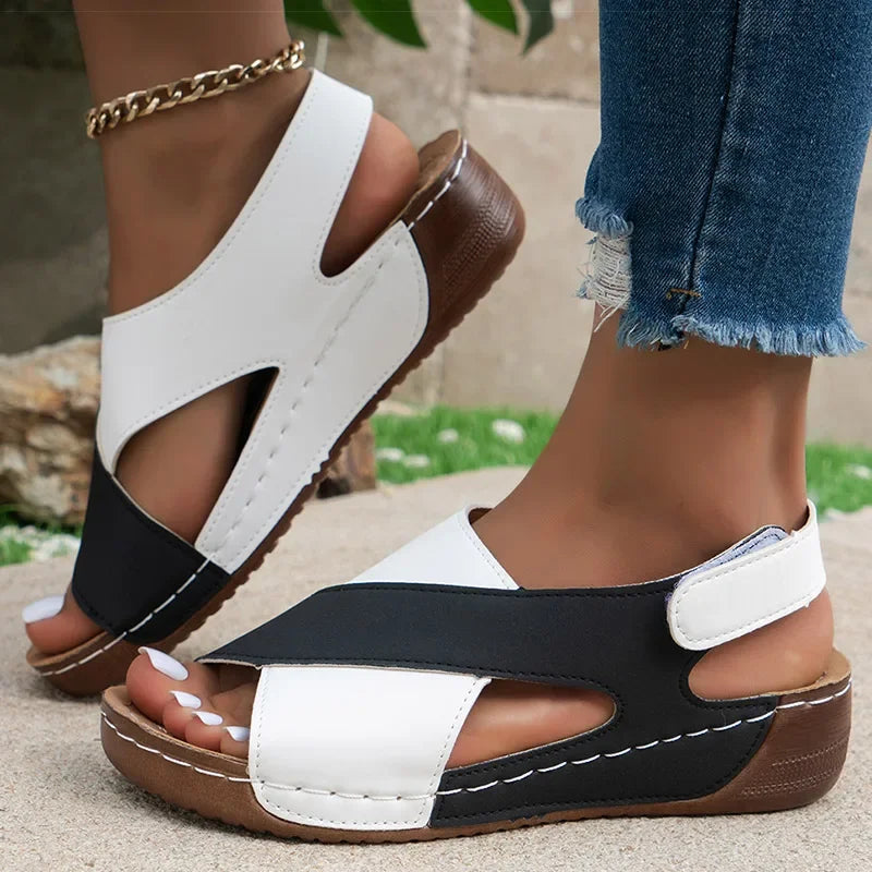 Lightweight wedge sandals with two-tone cross-strap design for summer