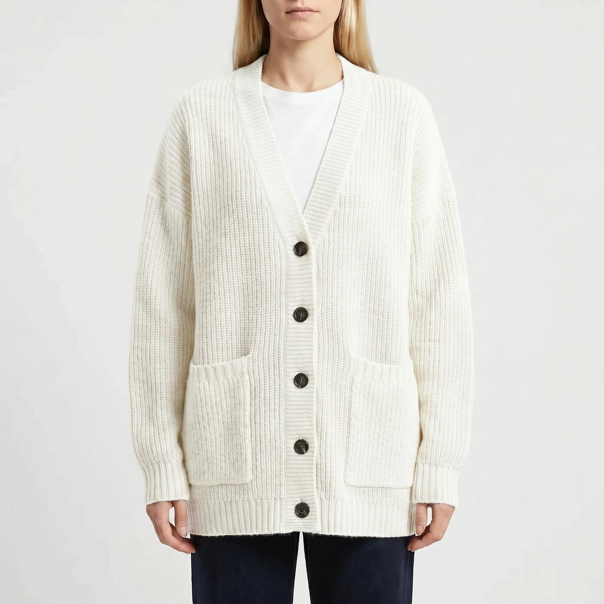 Oversized knit cardigan with deep V-neck and patch pockets for women