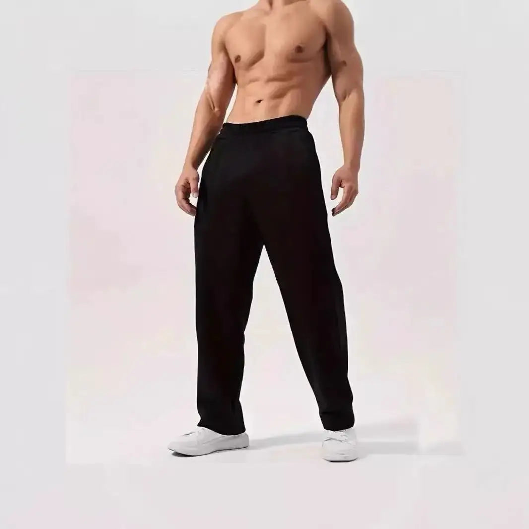 Men's baggy sweatpants with relaxed full-length fit and elastic waist